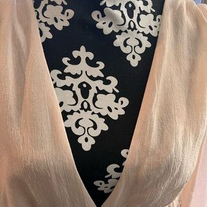 Light blush pink long maxi, high gathered waist. Open back with ties